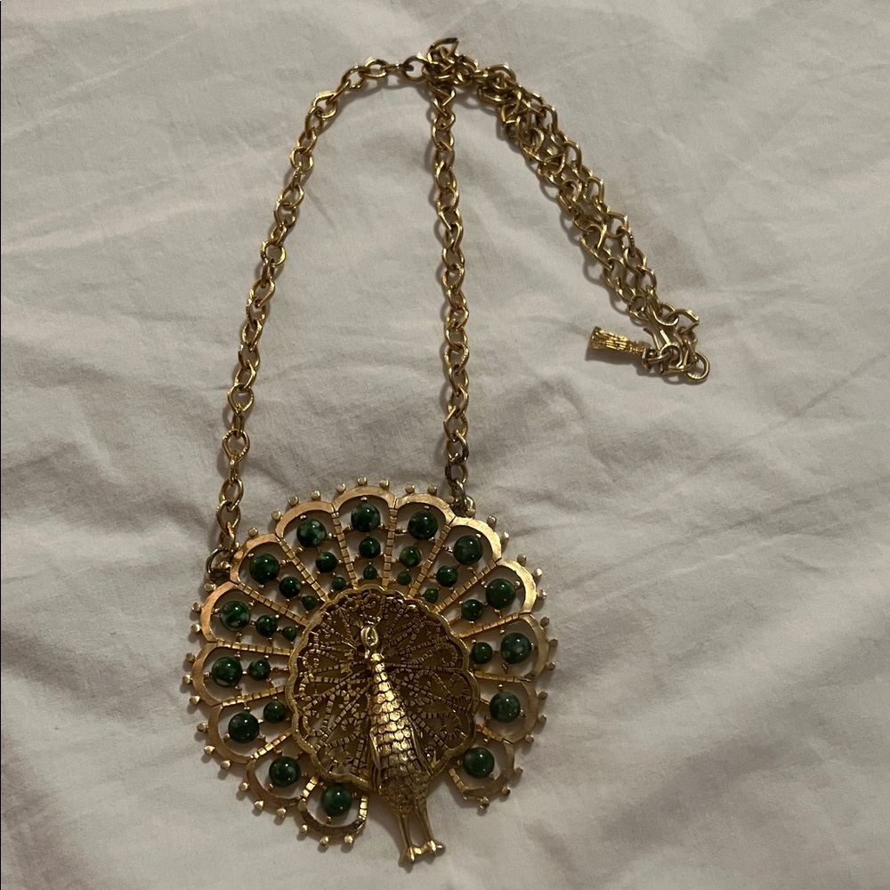 Gold Crown Inc .  Gold tone and Green Glass bead Peacock Pendant Necklace